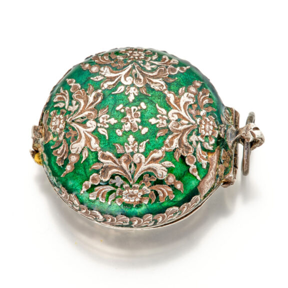 Decorative silver and enamel pill box in watch form Circa 1650 Decorative silver and enamel pill box in watch form Circa 1650