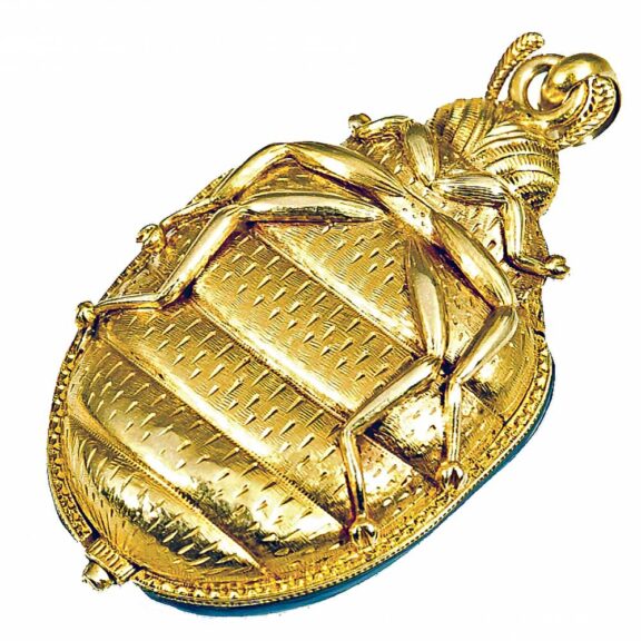 French gold, enamel watch in the form of a beetle Circa 1867 French gold, enamel watch in the form of a beetle Circa 1867