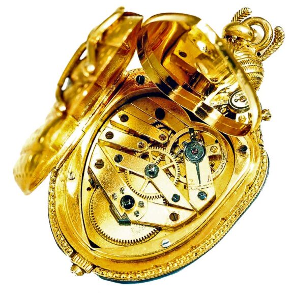 French gold, enamel watch in the form of a beetle Circa 1867 French gold, enamel watch in the form of a beetle Circa 1867
