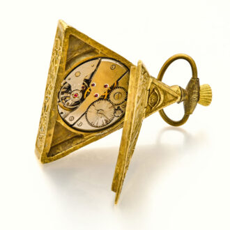 Swiss brass triangular keyless Masonic form watch Circa 1960