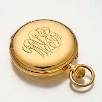 Heavy English gold watch with 52 1/2 minute carrousel Circa 1906