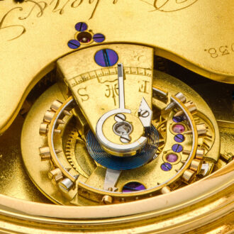 Heavy English gold watch with 52 1/2 minute carrousel Circa 1906