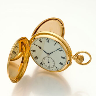Heavy English gold watch with 52 1/2 minute carrousel Circa 1906