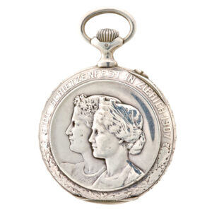 Swiss silver keyless lever with high relief cast case Circa 1907