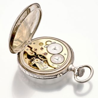Swiss silver keyless lever with high relief cast case Circa 1907