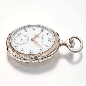 Swiss silver keyless lever with high relief cast case Circa 1907