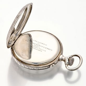 Swiss silver keyless lever with high relief cast case Circa 1907