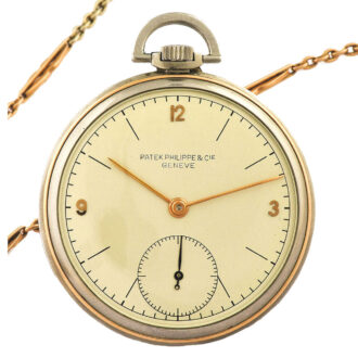 Fine stainless steel and 14K pink gold pocket watch Circa 1938