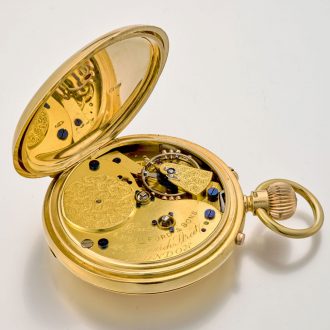 Heavy English gold half hunter watch with power reserve Circa 1896