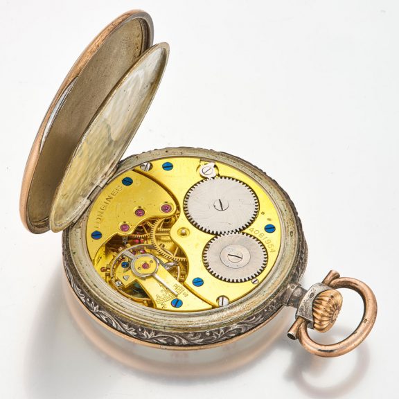 Swiss silver lever watch with repousse hunting scene Circa 1930 Swiss silver lever watch with repousse hunting scene Circa 1930