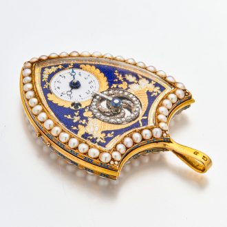 Swiss gold shield shaped watch with visible balance Circa 1800