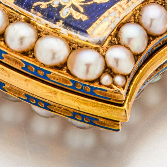 Swiss gold shield shaped watch with visible balance Circa 1800 Swiss gold shield shaped watch with visible balance Circa 1800