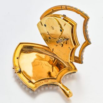 Swiss gold shield shaped watch with visible balance Circa 1800