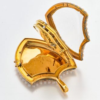 Swiss gold shield shaped watch with visible balance Circa 1800