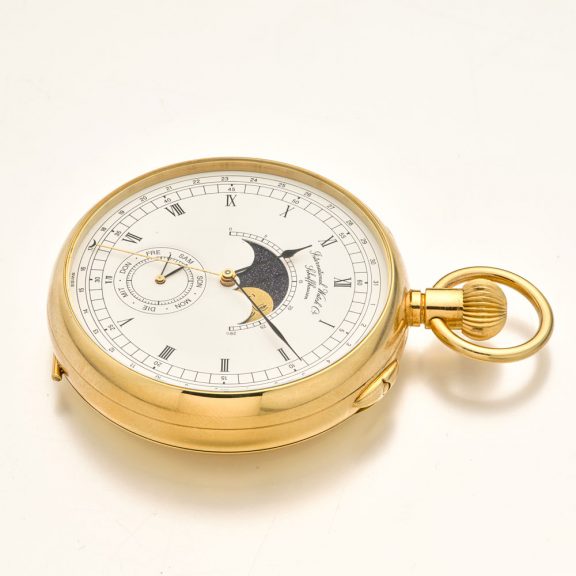 Extraordinary Swiss 18K gold watch with calendar Circa 1999 Extraordinary Swiss 18K gold watch with calendar Circa 1999