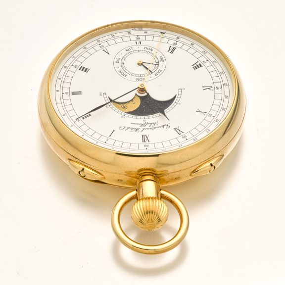 Extraordinary Swiss 18K gold watch with calendar Circa 1999 Extraordinary Swiss 18K gold watch with calendar Circa 1999