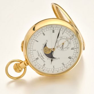 Extraordinary Swiss 18K gold watch with calendar Circa 1999
