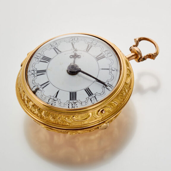 An English verge in 20 carat gold repousse pair cases Circa 1765 An English verge in 20 carat gold repousse pair cases Circa 1765