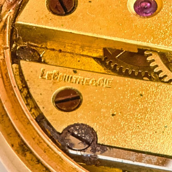Swiss gold, enamel and diamond set miniature watch Circa 1900 Swiss gold, enamel and diamond set miniature watch Circa 1900