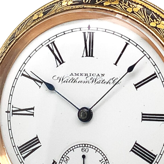 American decorative metal with gold inlaid pocket watch Circa 1900 American decorative metal with gold inlaid pocket watch Circa 1900