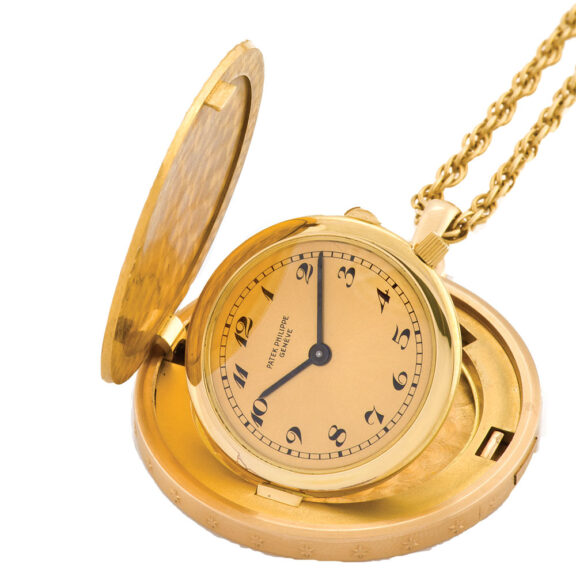 Swiss lady’s pendant watch accompanied by a gold chain Circa 1960