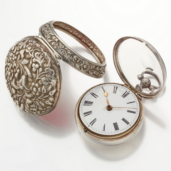 An English repousse verge in silver pair cases Circa 1832 An English repousse verge in silver pair cases Circa 1832