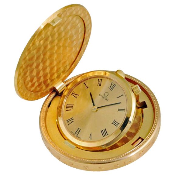 Swiss remarkable small pocket watch in a gold coin Circa 1973