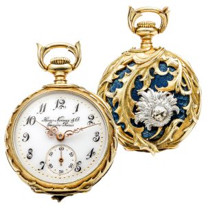 Swiss gold watch with blue champlevé background Circa 1900