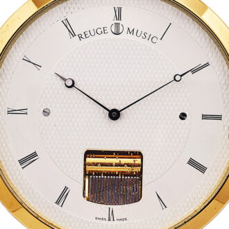 Swiss gilt-metal lever with visible built in music box Circa 1987