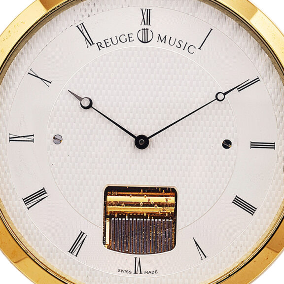 Swiss gilt-metal lever with visible built in music box Circa 1987 Swiss gilt-metal lever with visible built in music box Circa 1987