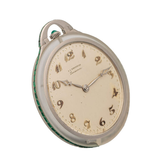Swiss platinum, glass crystal, and emeralds dress watch Circa 1930 Swiss platinum, glass crystal, and emeralds dress watch Circa 1930