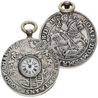 Swiss watch with buttonhole dial and St. George coin case Circa 1900