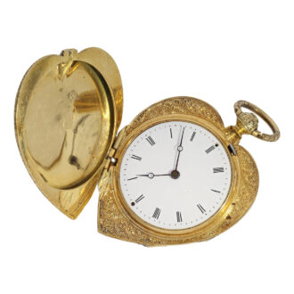 Swiss gold and enamel watch in the shape of a heart Circa 1850 Swiss gold and enamel watch in the shape of a heart Circa 1850