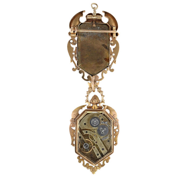 Rare gold, enamel watch in the shape of a coat of arms Circa 1880 Rare gold, enamel watch in the shape of a coat of arms Circa 1880