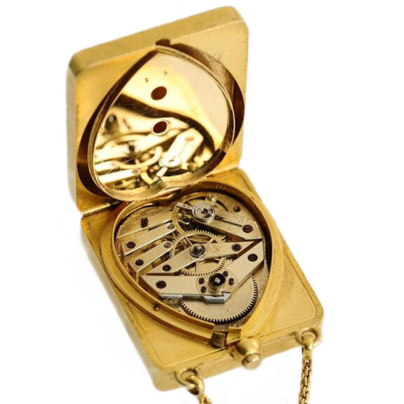 Swiss gold and enamel purse form cylinder watch Circa 1840 Swiss gold and enamel purse form cylinder watch Circa 1840