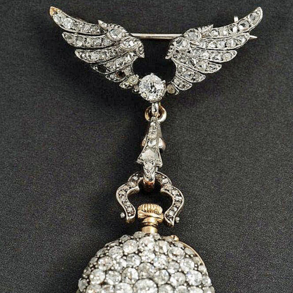 French diamond-set watch with matching brooch Circa 1900 French diamond-set watch with matching brooch Circa 1900