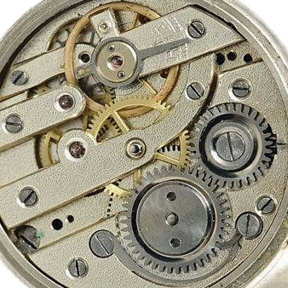 Extremely rare Swiss nickel and gold buttonhole watch Circa 1890 Extremely rare Swiss nickel and gold buttonhole watch Circa 1890