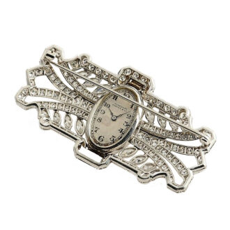Swiss diamond Art Deco platinum brooch watch Circa 1938