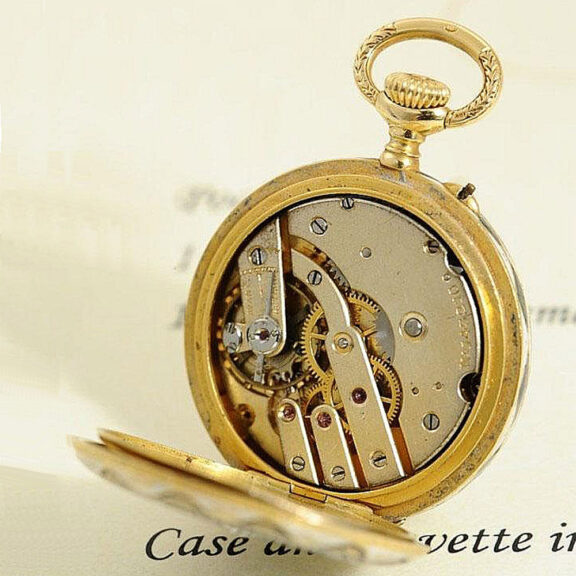 Swiss very small gold enamel pendant watch Circa 1907 Swiss very small gold enamel pendant watch Circa 1907