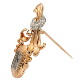 Swiss brilliant set brooch with integrated watch Circa 1930
