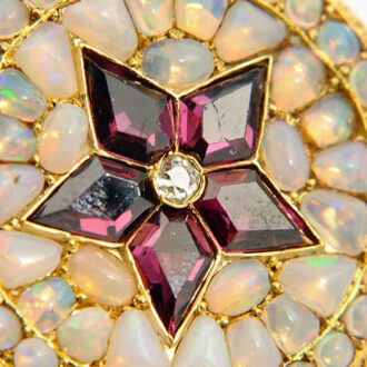 Swiss precious pendant watch studded with gemstones Circa 1880