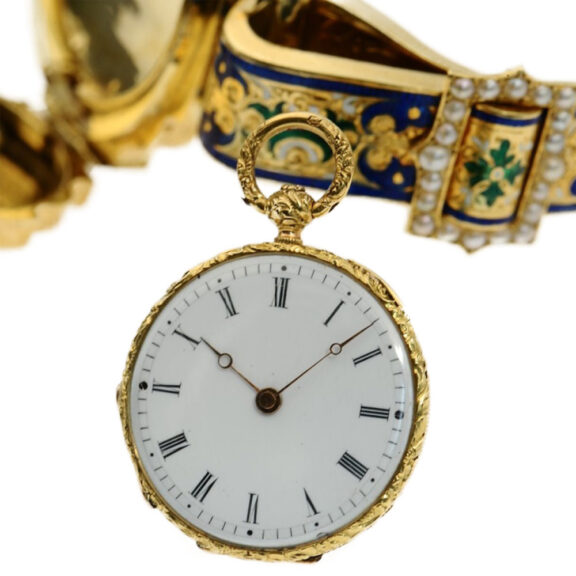 Swiss thin gold enamel pocket watch set in a bracelet Circa 1820 Swiss thin gold enamel pocket watch set in a bracelet Circa 1820