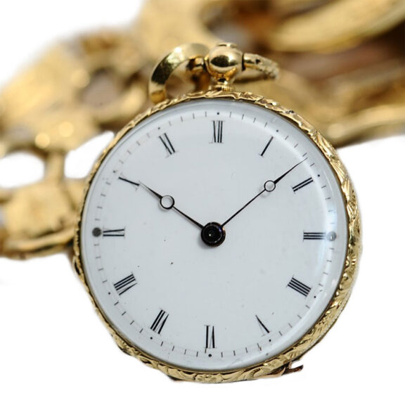 Swiss/French miniature gold enamel pendant watch Circa 1820 Swiss/French miniature gold enamel pendant watch Circa 1820