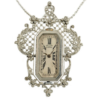 French diamond set pendant with medallion and watch Circa 1910