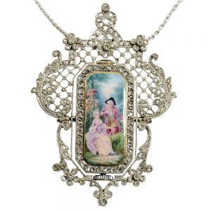 French diamond set pendant with medallion and watch Circa 1910