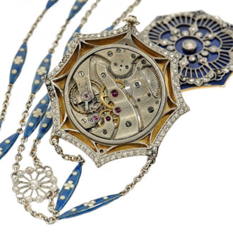 Swiss thin diamond-set gold/platinum pendant watch Circa 1910