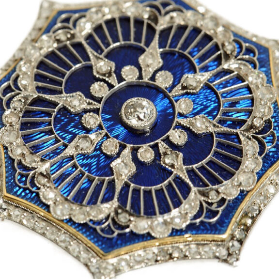Swiss thin diamond-set gold/platinum pendant watch Circa 1910 Swiss thin diamond-set gold/platinum pendant watch Circa 1910