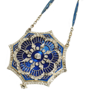 Swiss thin diamond-set gold/platinum pendant watch Circa 1910