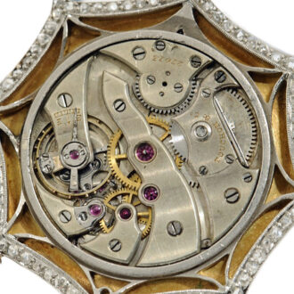 Swiss thin diamond-set gold/platinum pendant watch Circa 1910