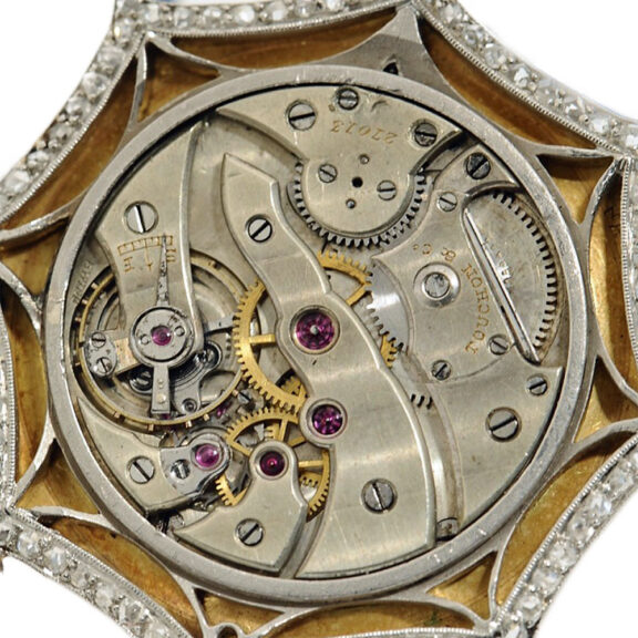 Swiss thin diamond-set gold/platinum pendant watch Circa 1910 Swiss thin diamond-set gold/platinum pendant watch Circa 1910